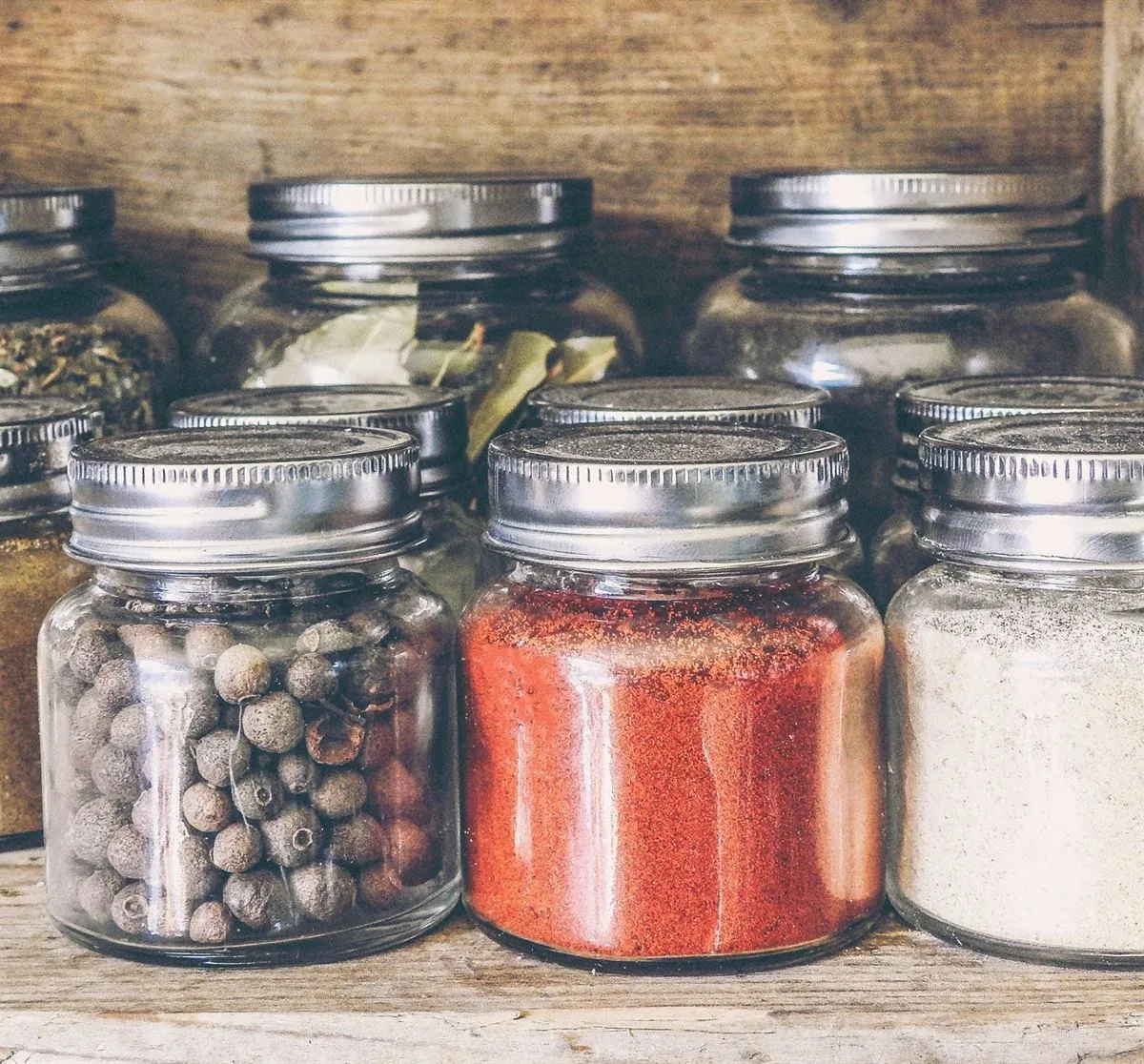 Green cardamom stored in an airtight jar