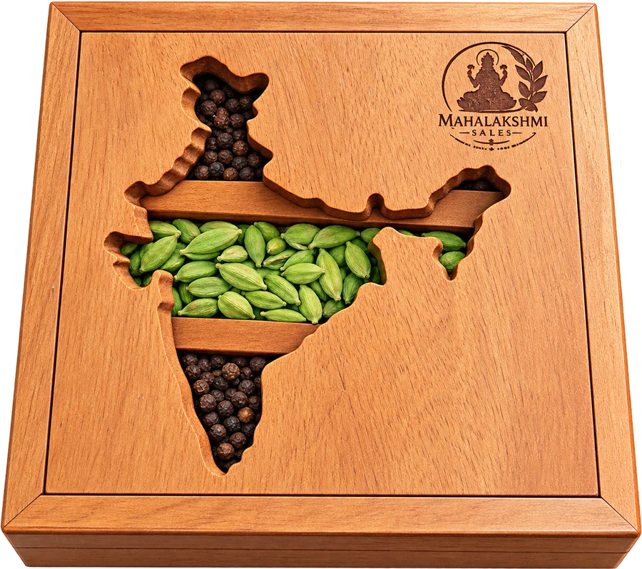 Wooden gift box with a carved map of India filled with green cardamom and black pepper