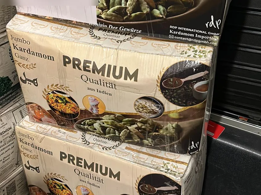 Premium cardamom cartons stacked for dispatch